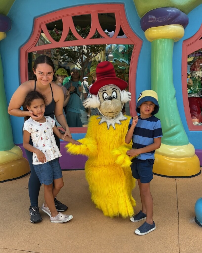Our daughter with the twins she cared for — the inspiration behind Current of Hope